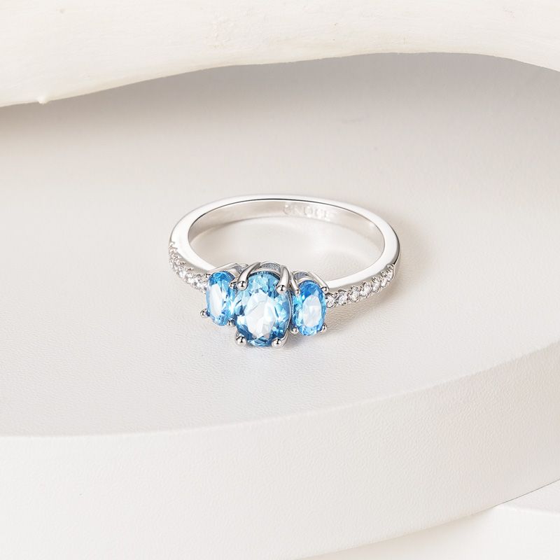 Anillo de Tres Piedras Azul Cielo