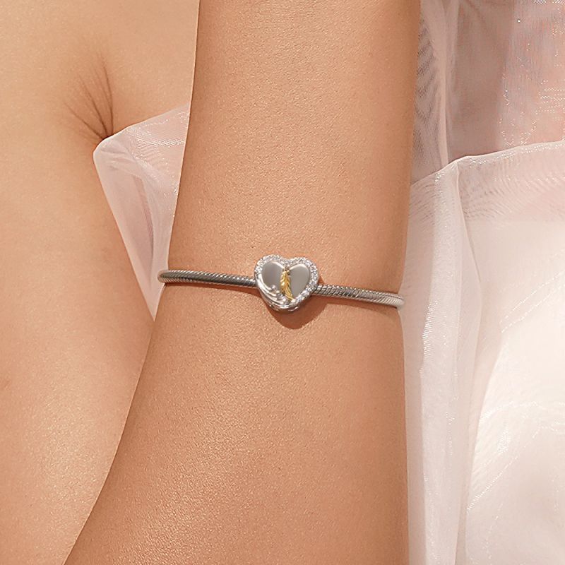 Colgante Corazón Pluma Oro