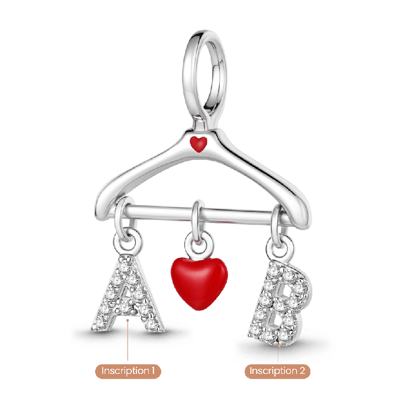 Amuleto de tendedero con inicial personalizada