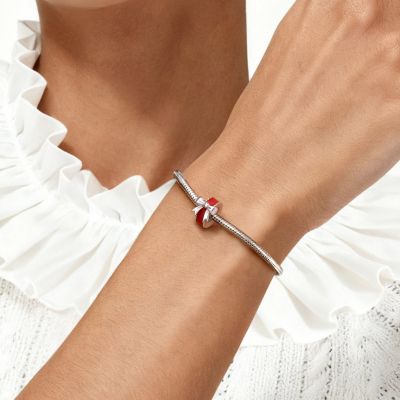 Tapón con Lazo Rojo